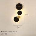Conversation-starting Acrylic Clock Wall Light, for living and dining rooms, for living room, black-and-gold acrylic clock face