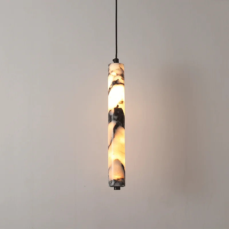 Product photo of the veined cylinder led pendant light.