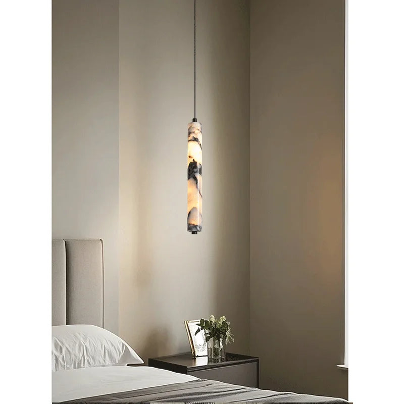Product photo of the veined cylinder led pendant light.