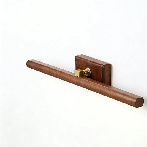 Close detail of the wood-tone sconce head, diffuser and wall mounting
