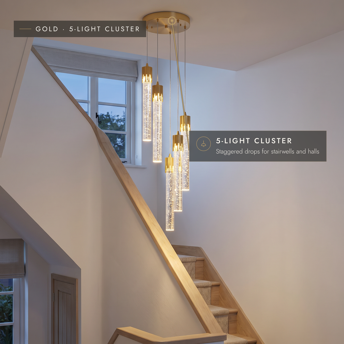 Gold five-light bubble tube cluster pendant in a stairwell