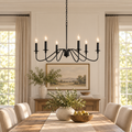 Black vintage candle chandelier installed above a dining table