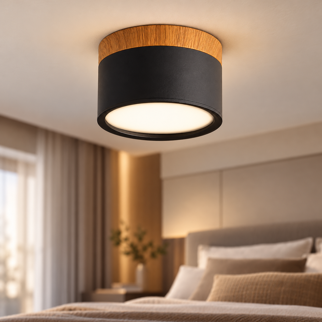 Black wood-style LED downlight installed in a refined bedroom