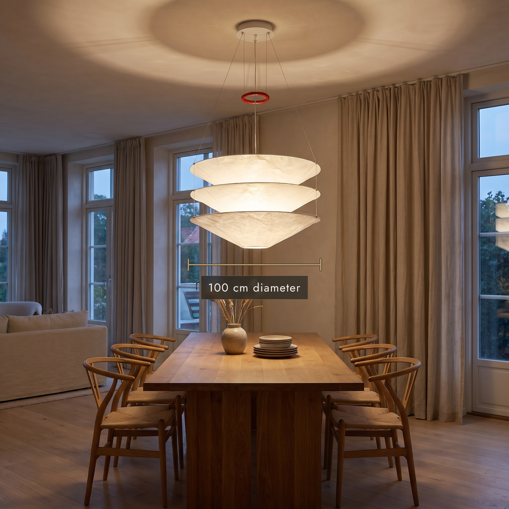 100 cm layered paper pendant chandelier above a long wooden dining table in an open-plan room
