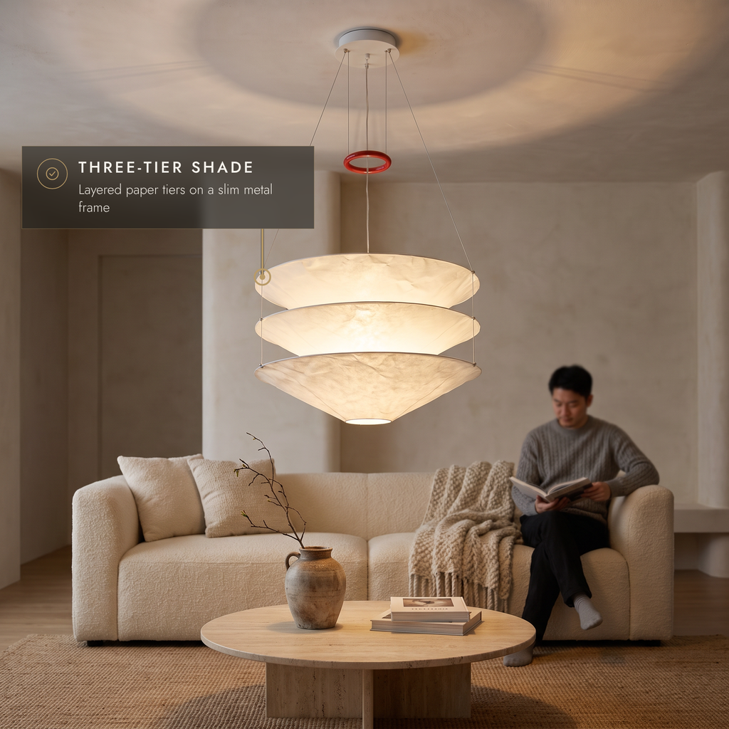 80 cm three-tier paper pendant light above a travertine coffee table in a cosy living room