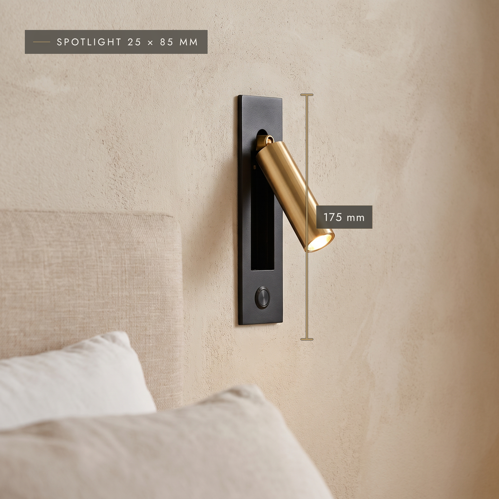 Close-up of the black and gold wall reading light with folding spotlight and touch button