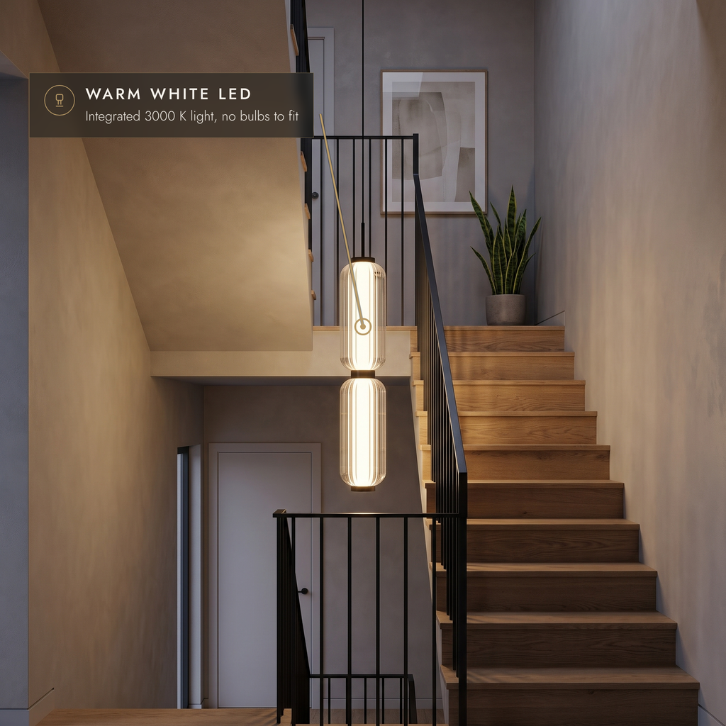 Two stacked ribbed LED pendant in black finish in a townhouse stairwell