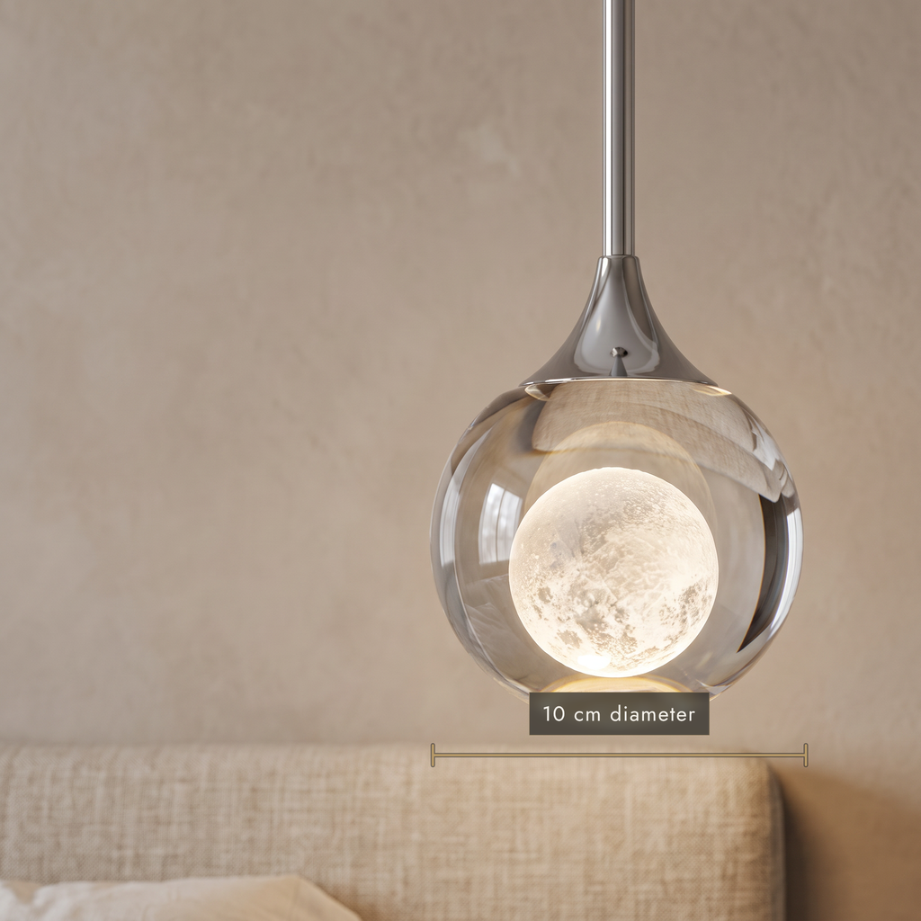 Close-up of the 10 cm crystal-effect teardrop pendant and its moon-texture centre