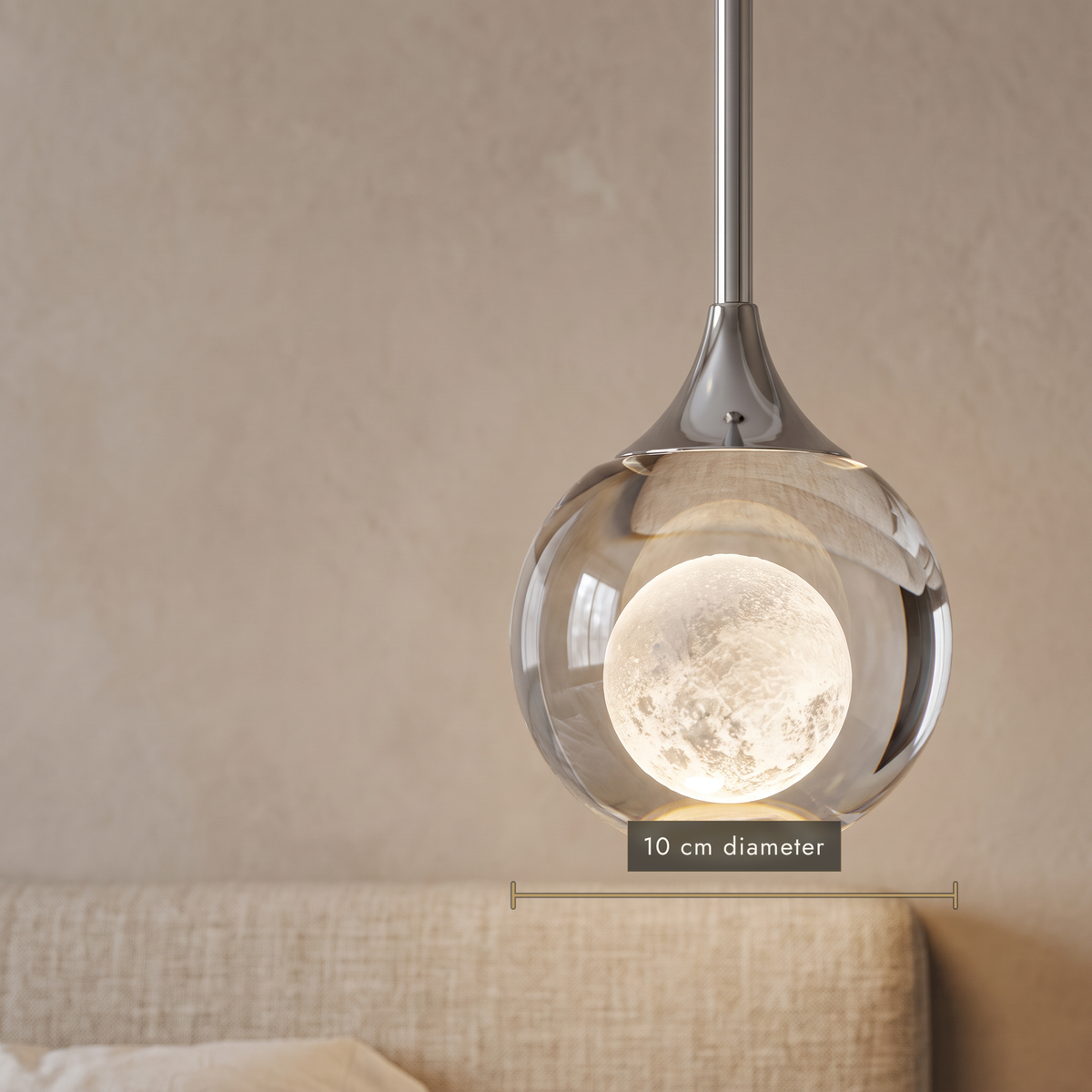 Close-up of the 10 cm crystal-effect teardrop pendant and its moon-texture centre