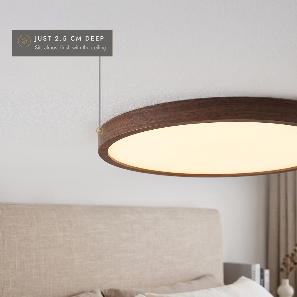 Close-up of the 2.5 cm deep walnut-effect LED ceiling light